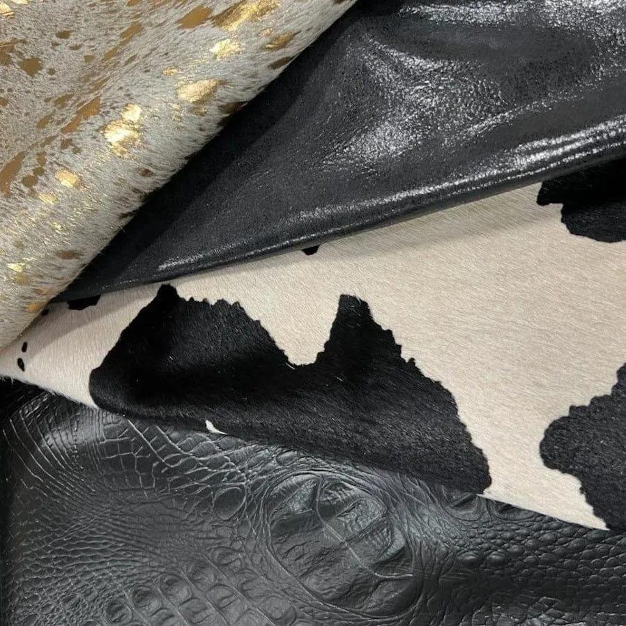 Black Cow Print Stencil Over Off-White Cowhide
