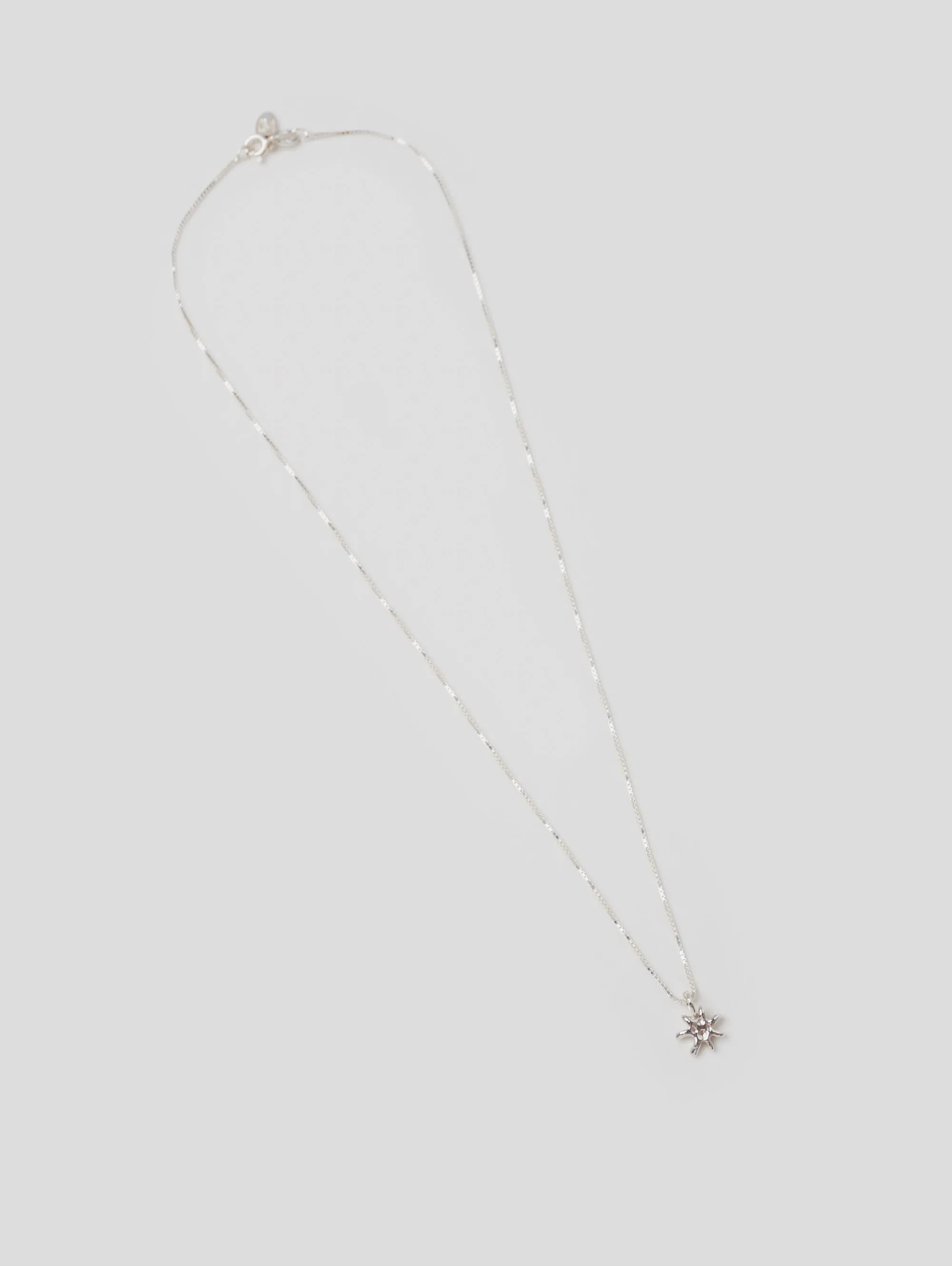 Sun Charm Necklace in Sterling Silver