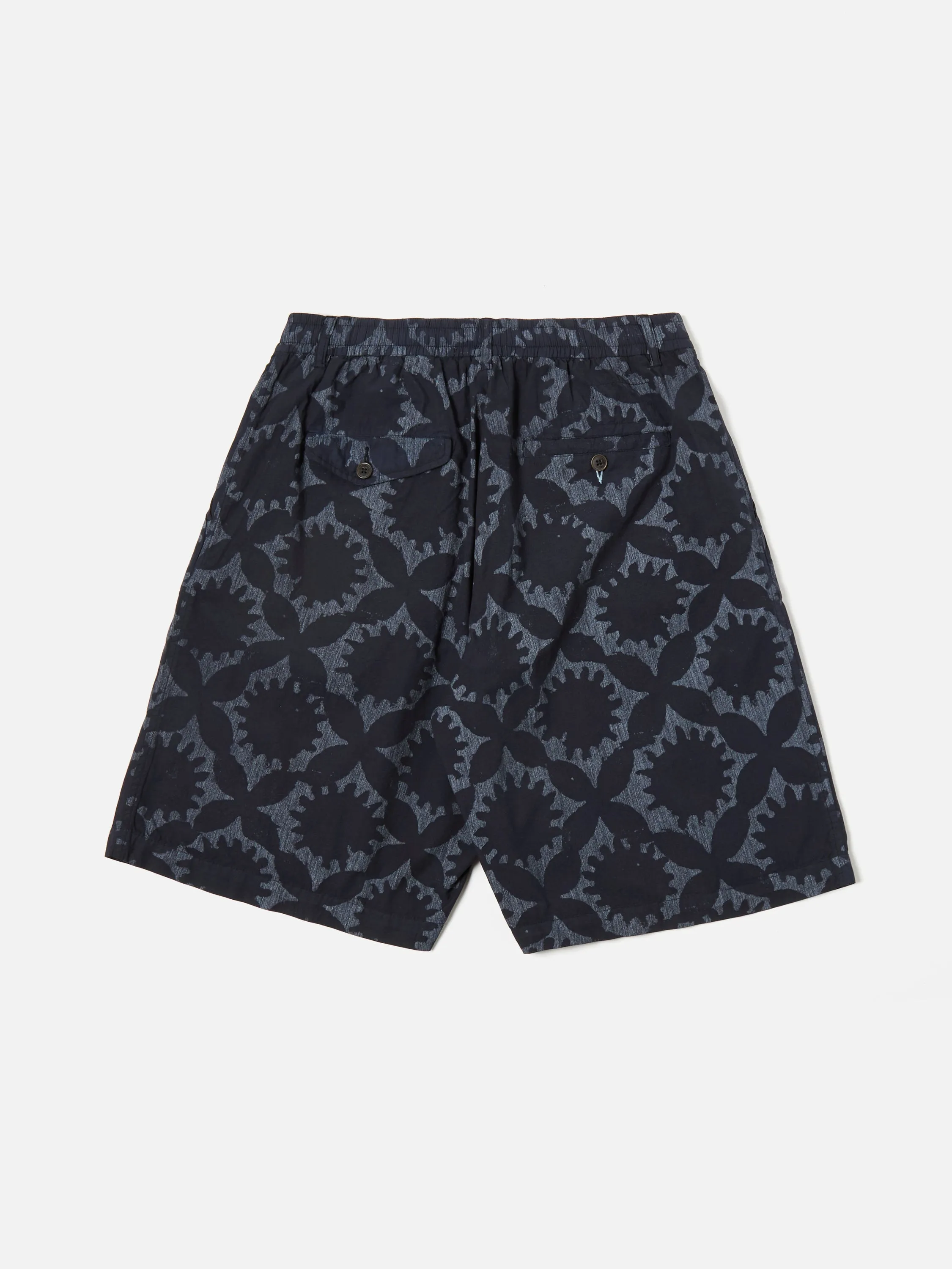 Universal Works Pleated Track Short in Navy Over Dyed Sun Print